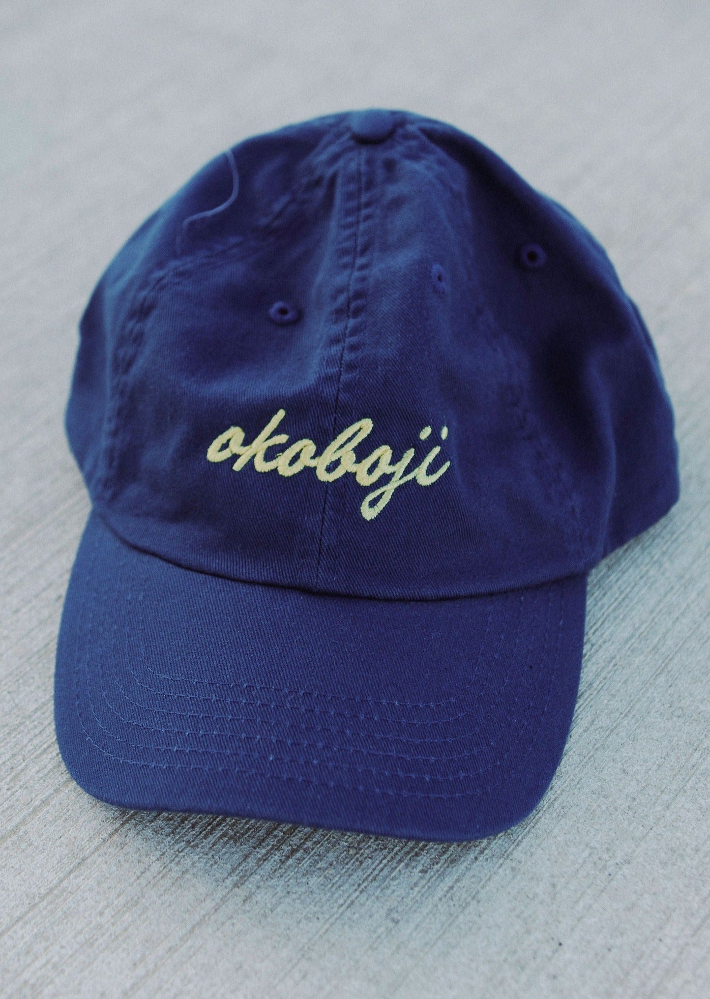 OKOBOJI SCRIPT HAT ROYAL BLUE