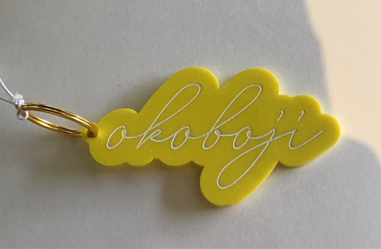 Load image into Gallery viewer, Yellow okoboji keychain
